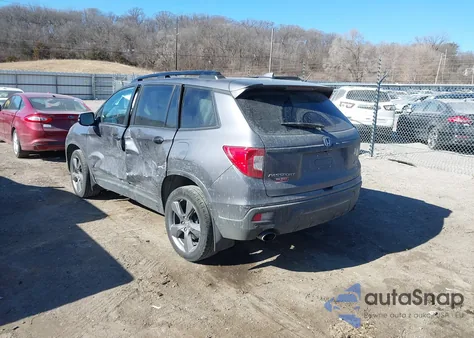 2019 Honda Passport Touring z USA, uszkodzony, nr VIN 5FNYF8H92KB001173